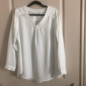 Ivory V-neck pullover tunic top
